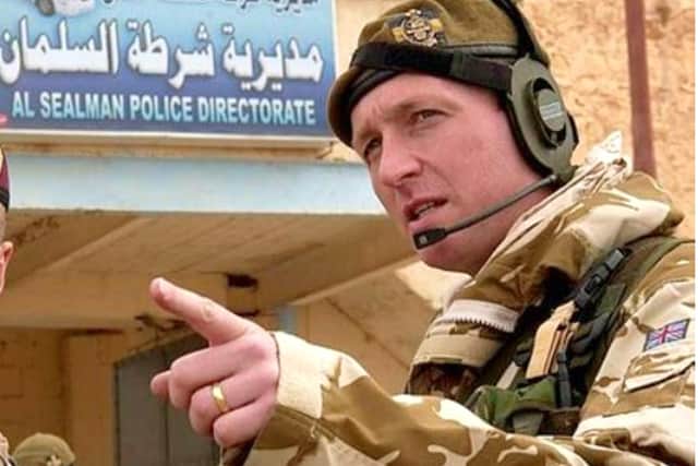 Lt Col (retired) Chris Parker (right) in Iraq.