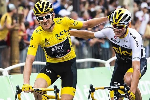Geraint Thomas celebrates with team-mate Chris Froome on the Tour de France