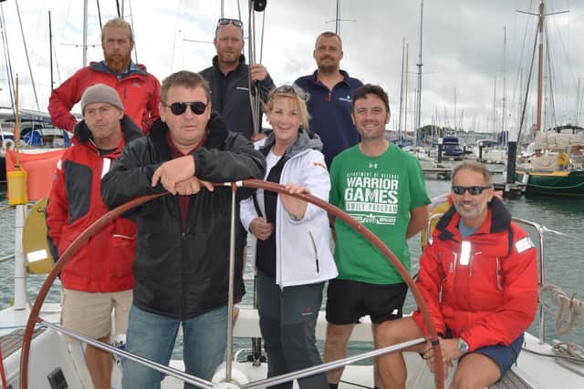 The Turn To Starboard team on board their vessel in Haslar Marina. Picture: David George
