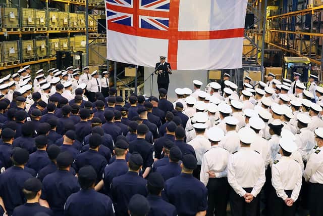 Commanding Officer Captain Stephen Moorhouse OBE speaks to some of his crew after taking over from senior naval officer capt Ian Groom MBE. Photo: Royal Navy