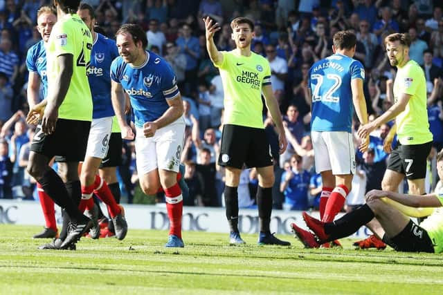 Brett Pitman celebrates scoring during Pompey's 2-0 victory over Peterborough on the final day of last season. Picture: Joe Pepler