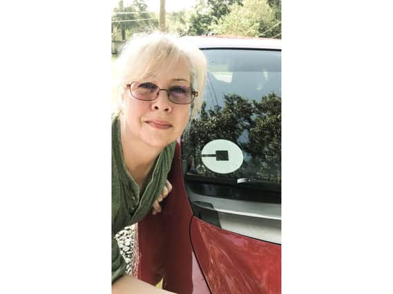 Uber driver Bonnie Ginter, 51, of Florida, who has thanked HMS Queen Elizabeth sailors who helped to repair her car