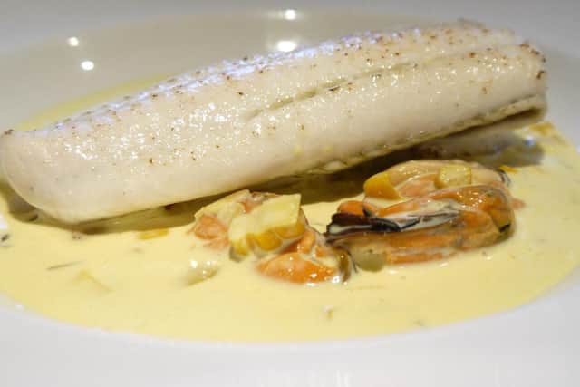 Plaice with sweetcorn, turmeric and mussel sauce.