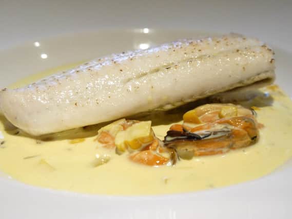 Plaice with sweetcorn, turmeric and mussel sauce.
