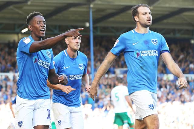 Brett Pitman, right, is Pompey's highest-rated player on FIFA 19. Picture: Joe Pepler