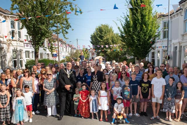 The street party in Allens Road, Southsea earlier this month, with Deputy Lord Mayor Cllr David Fuller and Deputy Lady Mayoress Leza Tremorin with the organisers and residents Picture: Vernon Nash (180429-050)