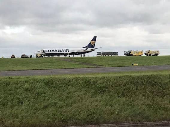 The damaged plane after it had touched down at East Midlands Airport