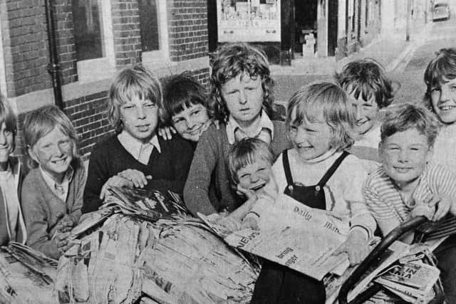 Boys from Buckland help to raise cash by collecting waste paper.