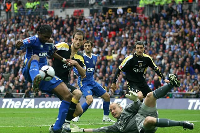 Portsmouth's Nwankwo Kanu scores his sides first goal of the game against Cardiff City in the 2008 FA Cup final