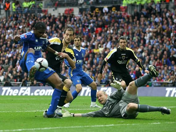 Portsmouth's Nwankwo Kanu scores his sides first goal of the game against Cardiff City in the 2008 FA Cup final