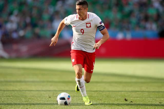 Ronan Curtis rubbed shoulders with Robert Lewandowski during Republic of Ireland's 1-1 draw with Poland. Picture: PA Images