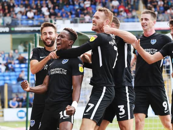 Jamal Lowe and his team mates celebrate after scoring second goal in Portsmouth's 2-1 win at Peterborough. Picture: Joe Pepler/Digital South.