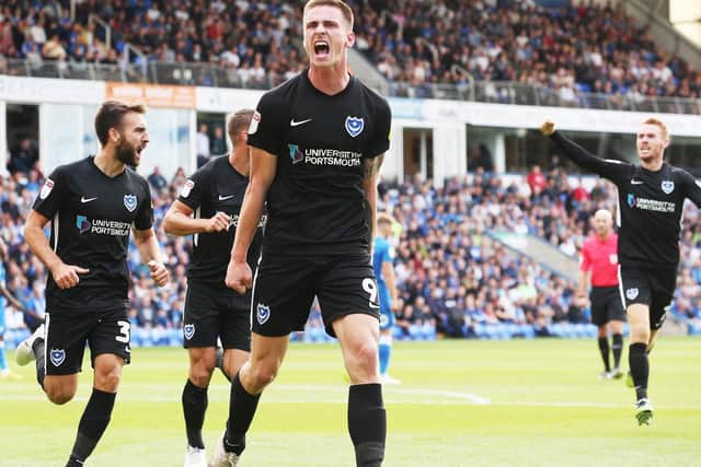 Oli Hawkins celebrates his opener at Peterborough. Picture: Joe Pepler