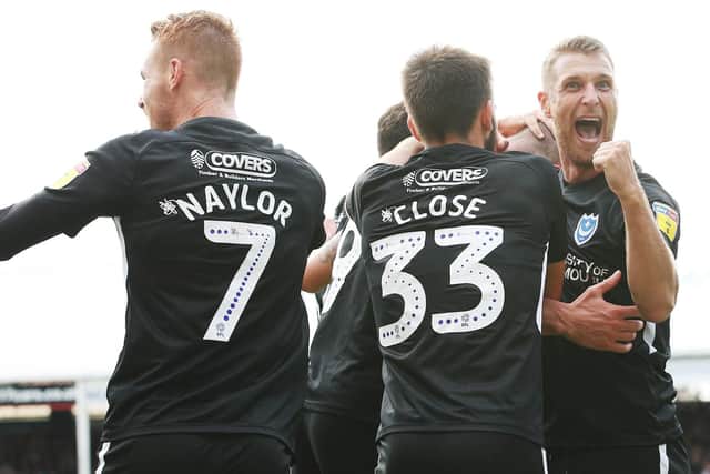 Pompey celebrate at Peterborough. Picture: Joe Pepler