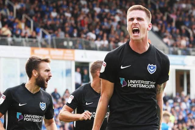 Pompey striker Oli Hawkins celebrates scoring his maiden goal of the season against Peterborough Picture: Joe Pepler