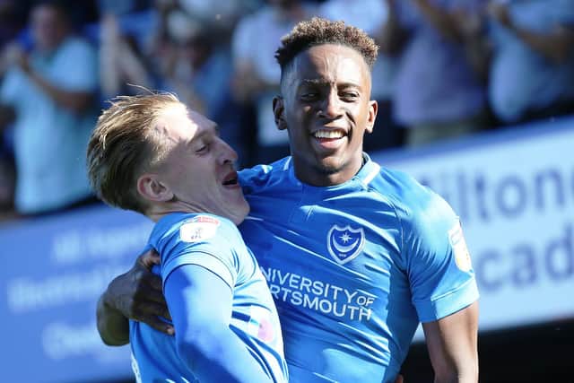 Ronan Curtis, left, celebrates with Jamal Lowe. Picture: Joe Pepler