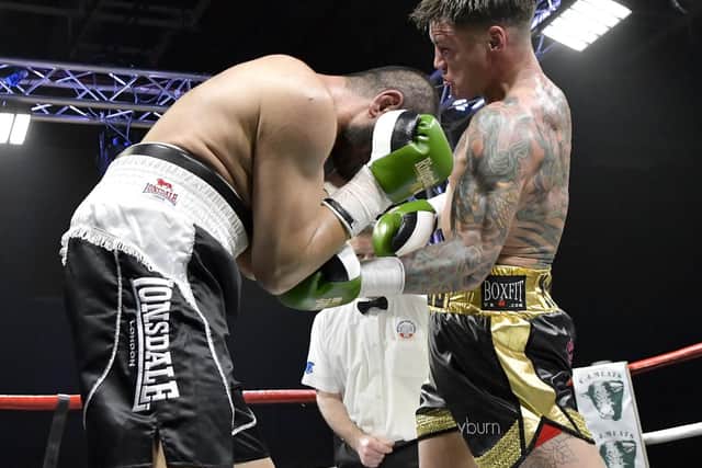 Joel McIntyre, right, in action against Tayar Mehmed Picture: Neil Marshall