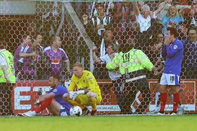 Ryan Allsop is devastated after Peter Hartley's last-gasp winner in the play-off semi-finals. Picture: Joe Pepler