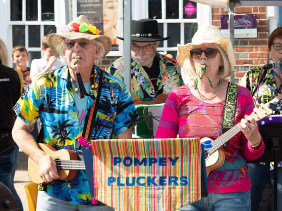 The Pompey Pluckers were there to entertain. Picture: Keith Woodland