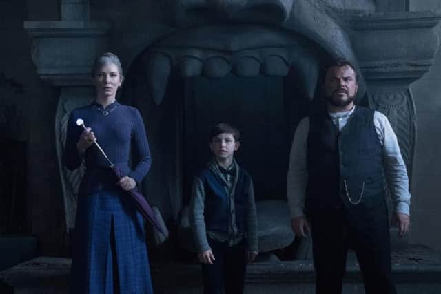 Cate Blanchett as Florence Zimmerman, Owen Vaccaro as Lewis Barnavelt and Jack Black as Jonathan Barnavelt.