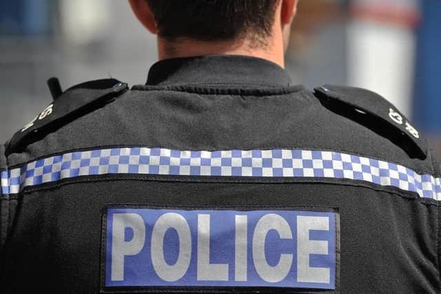 Police have arrested a man after a 69-year-old woman was mugged in Portsmouth