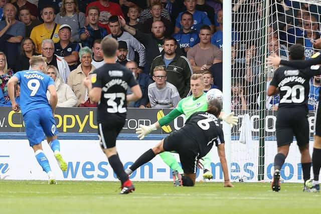 Peterborough's Matt Godden ruins Pompey's clean sheet with a stoppage-time consolation last Saturday. Picture: Joe Pepler