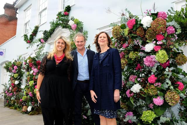 Actor Hugh Bonneville with Emma Schwarz, founder of The Rare Brand Market, left, and Marian Parfitt, Breast Cancer Haven centre manager Picture: Sarah Standing (180726-5284)