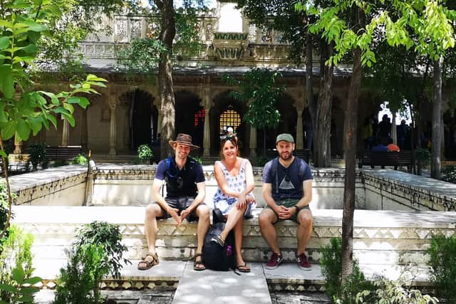 Cheryl Gibbs with cameramen Andy Davis, left, and Lloyd Thompson, right, on location in India
