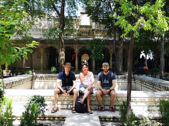 Cheryl Gibbs with cameramen Andy Davis, left, and Lloyd Thompson, right, on location in India