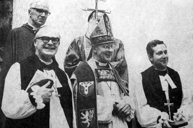 Pictured is the new bishop, front left, joined by the Archbishop of Canterbury Donald Coggan, centre, and the Bishop of Woolwich, Reverend Eric Marshall, leaving Westminster.