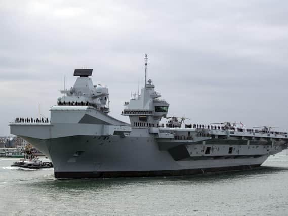 HMS Queen Elizabeth leaving Portsmouth Harbour