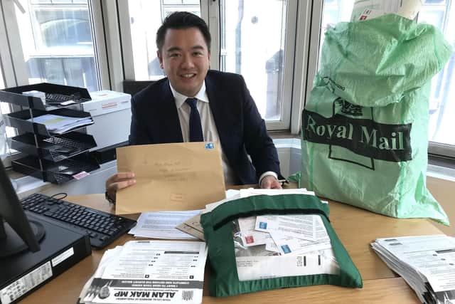 Alan Mak MP with his postbags in the House of Commons