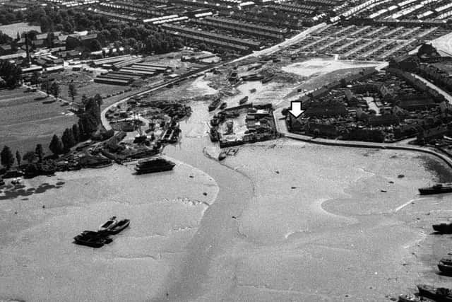 A view of Milton Lake with the houseboats alongside the eastern Road in the bottom right hand corner