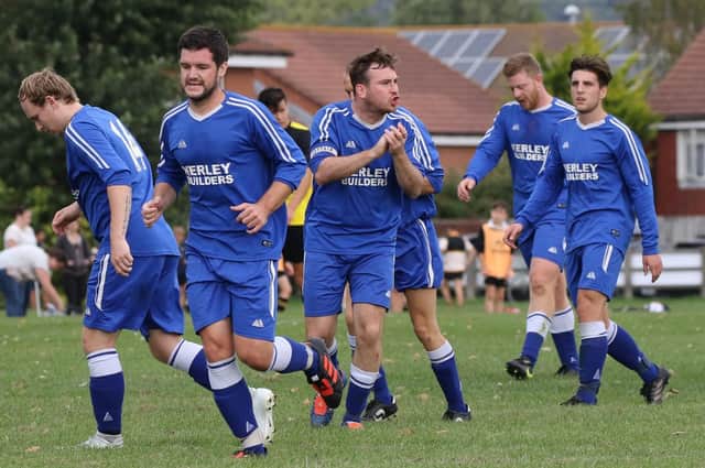 Portsmouth Sunday League outfit Kerley Builders celebrate a goal in their Challenge Cup first-round victory over Purbrook United at Rugby Camp. Picture: Kevin Shipp
