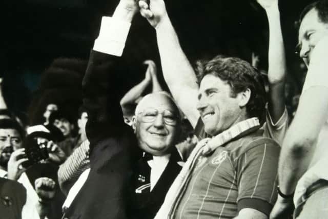 Pompey manager Alan Ball, right, celebrating  the club's 1986-87 promotion-winning season, with chairman John Deacon.