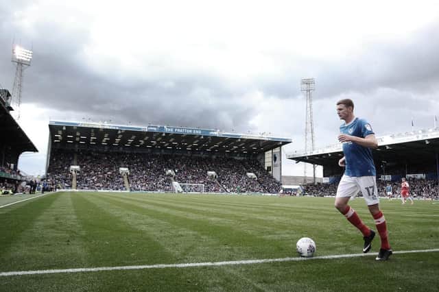 Dion Donohue goes to take a corner at Fratton Park. Picture: Joe Pepler