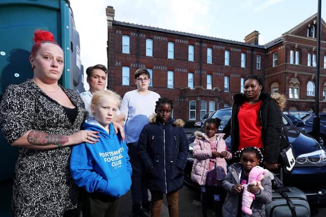 Residents of Finchdean Gardens, Milton, including Liz Sweeney, left, have not had running water for three days and have now had chemical toilets installed in the car park by their housing association Picture: Chris Moorhouse