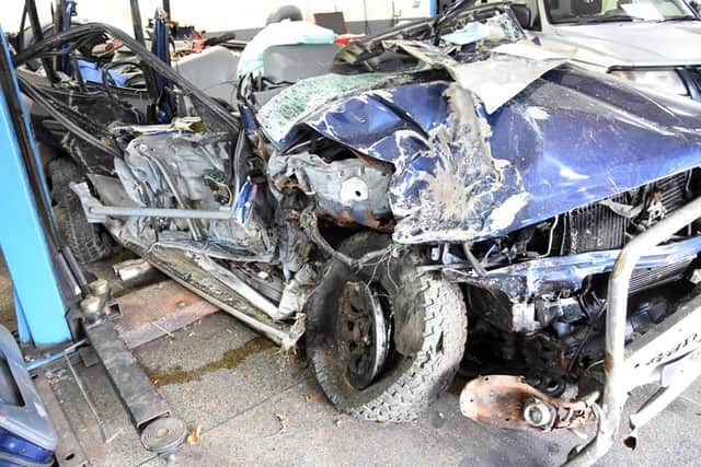 The wreckage of Rusty Brown's car Picture: Sussex Police