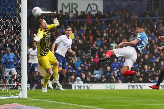 Gareth Evans scores an equaliser for Pompey against Wycombe Picture: Joe Pepler