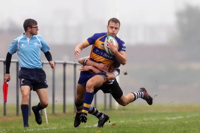 Wing James Wales hits fast forward for Gosport & Fareham against Farnham. Picture: Chris Moorhouse