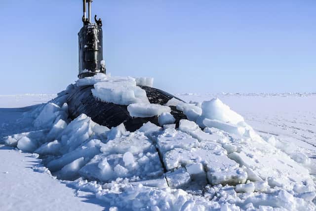 Royal Navy submarine HMS Trenchant breaks through the ice. Picture: PO Arron Hoare