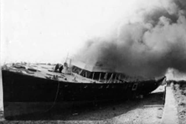 Believed to have been in 1961, the former MTB and home is destroyed by fire at its mooring.