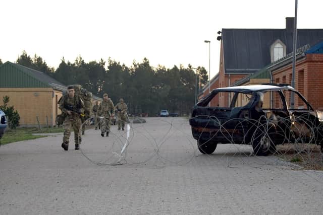 C Company of 4PWRR, who are based in Cosham, return from the exercise.
