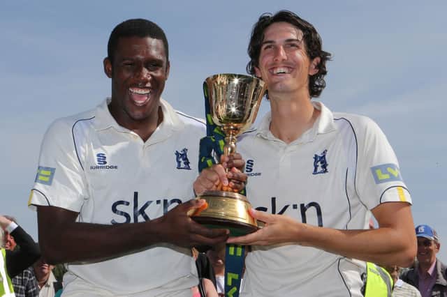 Keith Barker celebrates Warwickshire's County Championship title in 2012 with former Hampshire youngster Chris Wright, who will join Leicestershire next season