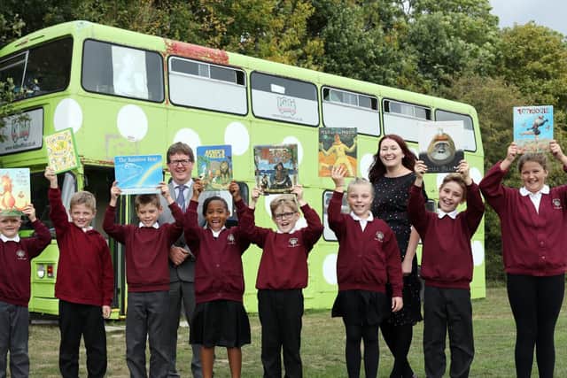 Ian Potter and headteacher Kerry Payne with pupils from Rowner Junior School. Picture: Chris Moorhouse