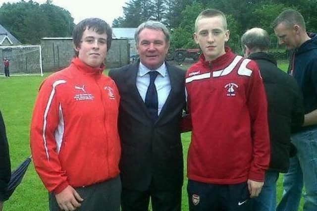 Ronan Curtis, right, alongside former Liverpool midfielder Ray Houlton, centre, and his friend Jason McCahill when playing for Swilly Rovers. Picture: Swilly Rovers
