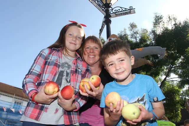 Aimee Walker, Elizabeth Walker and James Walker at a previous Apple Pressing Day at the Emsworth British Food Fortnight. Picture: Habibur Rahman