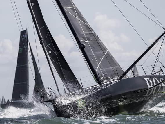 The HugoBoss IMOCA Open 60 race yacht skippered by Alex Thomson during the start of the 2017 Rolex Fastnet Race. Picture: Lloyd Images