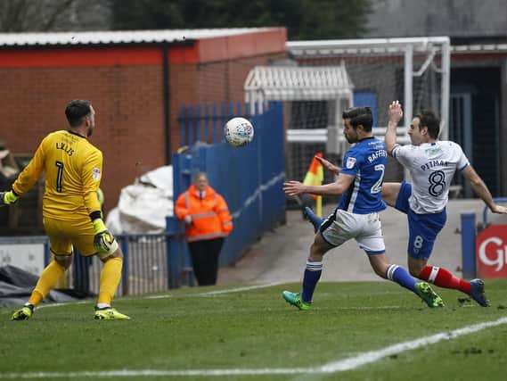 Pompey striker Brett Pitman scoring against Rochdale last season. Picture: Daniel Chesterton