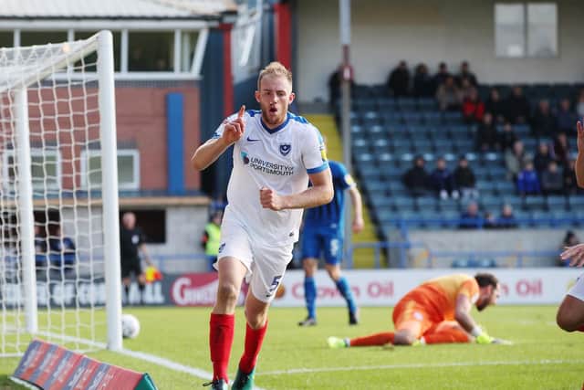 Matt Clarke celebrates scoring his goal against Rochdale